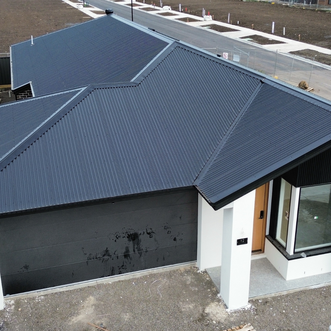 Roof plumbing and metal roofing work across multi-site development projects.